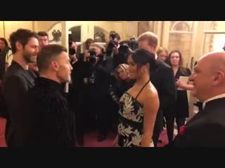 Meghan markle and prince harry chat with take that at the london palladium surely they’ll play the hits to impress the duchess