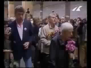 80yr old woman activist gets smacked upside her head during live interview