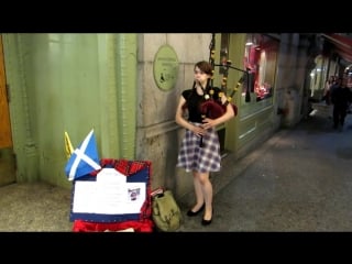 Mairi mason playing the bagpipes in nyc