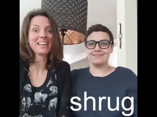 Shrug to raise your shoulders momentarily to show you don't know or don't care about something