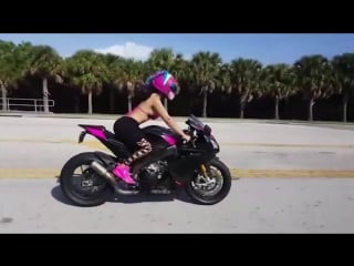 Marianny garcia riding fast wheelies down strip