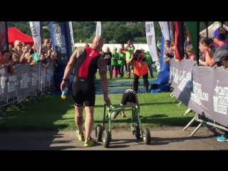 Bailey matthews aged 8 with cerebral palsy finishing triathlon