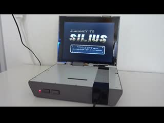 Modded nes console with a built in screen and speakers that can be played on the go (games are running through original nes har