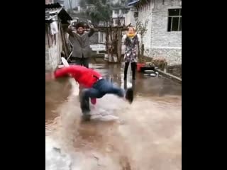 Peasant in communist china f0rced to blow dry public area using only his b0dy