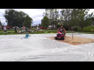 Lawn mower slip n slide filmed on a smartphone