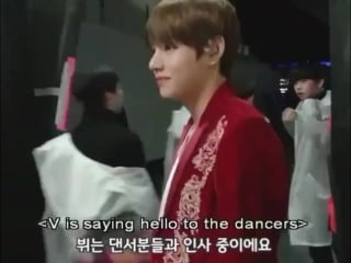 Taehyung was waiting for the backup dancers to greet them and congratulate, he gave a thum