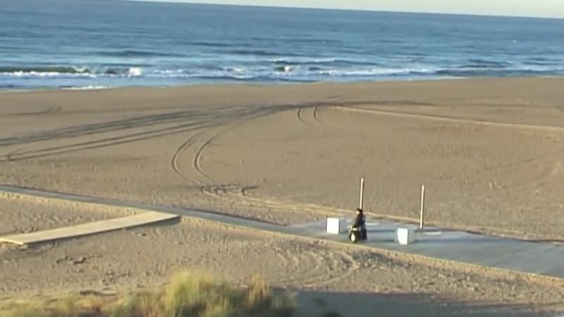 Paolo badano genny mobility sedia a rotelle in spiaggia barcellona segway wheelchair