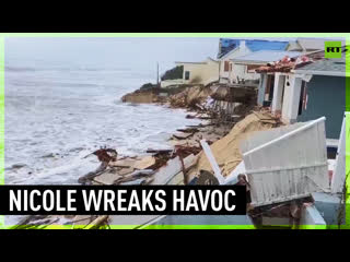 Tropical storm nicole topples beachfront homes in florida