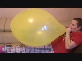 Yvy is blowing a tuftex 17 balloon by jennyloons really huge nonpop