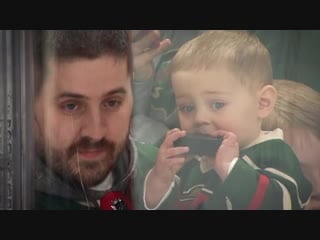 Young wild fan tries to make a snack out of dubnyk gifted souvenir