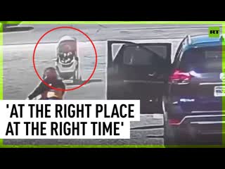 Bystander saves baby stroller from traffic