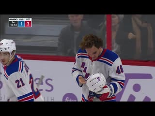 Brendan lemieux picks tooth up off the ice after high stick from christian jaros