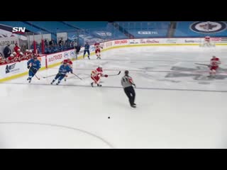 Gotta see it flames defenseman chris tanev beats connor hellebuyck from his own blue line