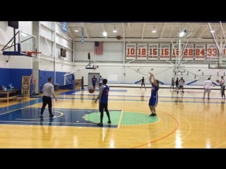 Ron baker shooting jumpers around the perimeter after practice