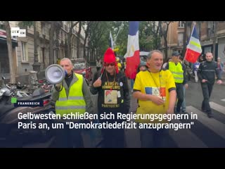 Gelbwesten schliessen sich regierungsgegnern in paris an, um "demokratiedefizit anzuprangern"