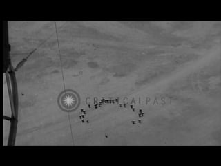 In an accident, three navy sailors hang on a cable from the zeppelin airship uss hd stock footage