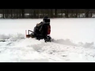 4×4 wheelchair snowplow plowing snow video