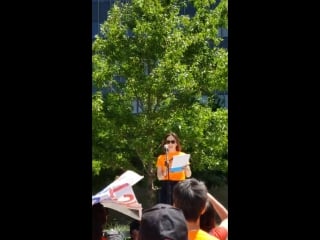 Alyssa milano activist is speaking at a protest in dallas against the nra convention