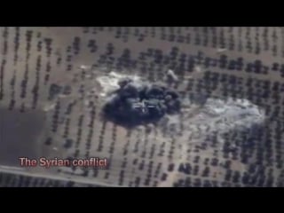 Airstrike russian planes su24 m at hiding place with armored vehicles and a fuel depots