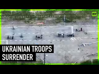 Drone footage shows ukrainian troops surrendering at azovstal