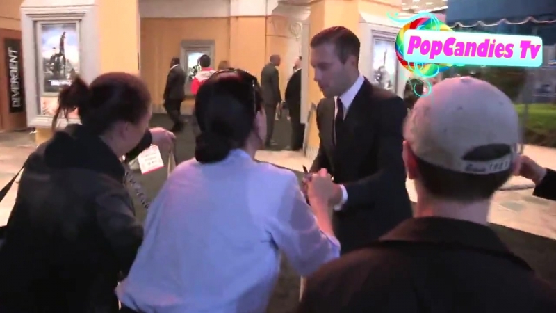 Jai courtney meets fans while departing divergent premiere at regency bruin thea