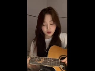 Haewon sings and plays guitar