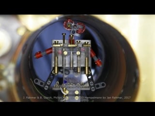 Magnetic control of robotic swarms