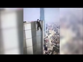 Shocking moment chinese daredevil falls to his porn