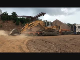 Loading and transporting the liebherr 974 with man 660