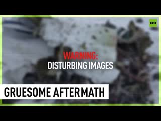 Investigators work at site of il 76 plane crash in belgorod region