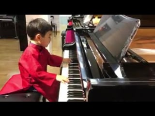 This is 18 yr old pianist evan le official with a beautiful version of diễm xưa a woman named diem