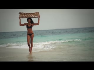 Chanel iman bares all poses with a python in zanzibar