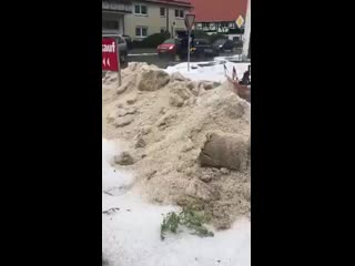 Clearing huge amounts of hail in wolfhagen, germany today, july 12th! report via jurnal de vreme mp4