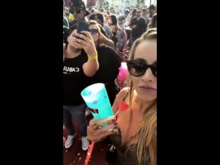 Unsuspecting lady has her drink spiked with