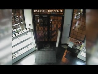 Surveillance video captures shootout between would be burglars, bouchards owner