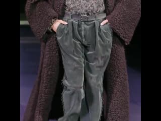 The dgmestieridarte men’s fashion show look features a double breasted shearling coat, a handmade wool and cashmere turtleneck s