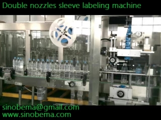 Double nozzles sleeve labeling machine