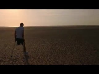 Crutching on the beach