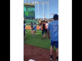 Kat mcnamara and her team in bigslickkc playing beisbol
