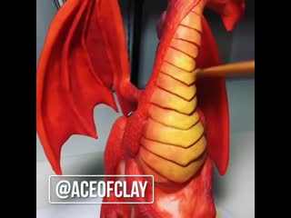 Turning a giraffe figurine into a dragon with polymer clay part 2