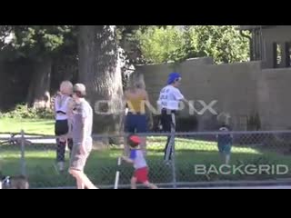 Kristen paying an game of softball at the park in la 09/08