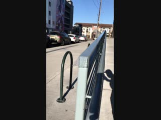 Ice melting on the handrail and sliding off