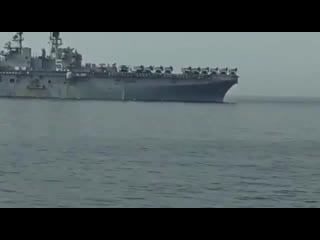 Footage captured from irin vessel shows uss bataan lhd 5 and other usn vessels entering strait of hormuz