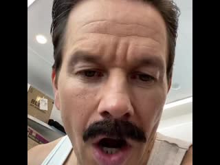 Uncharted star mark wahlberg reveals first look at sully and his glorious mustache