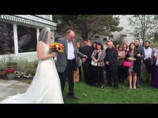 Dad surprises daughter by walking her down the aisle at her wedding