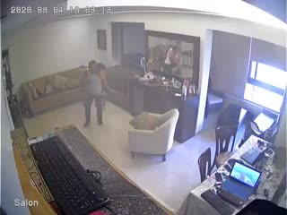 A father protecting his son from the very recent catastrophe in lebanon