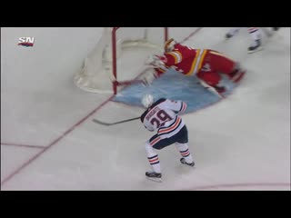 David rittich robs leon draisaitl with incredible diving save