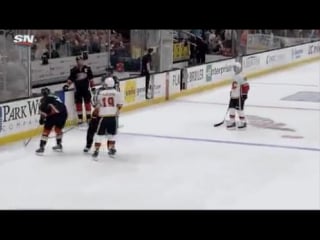 Bieksa not allowing calgary flames forward matthew tkachuk to collect the game puck for mike smith