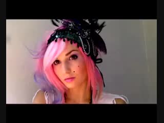 Purple hair, feather head [audrey kitching]