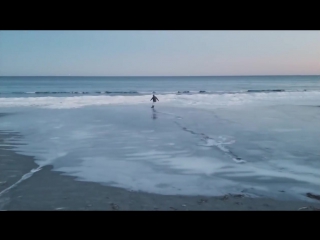 Mans ice skating escapade on frozen maine beach captured on video